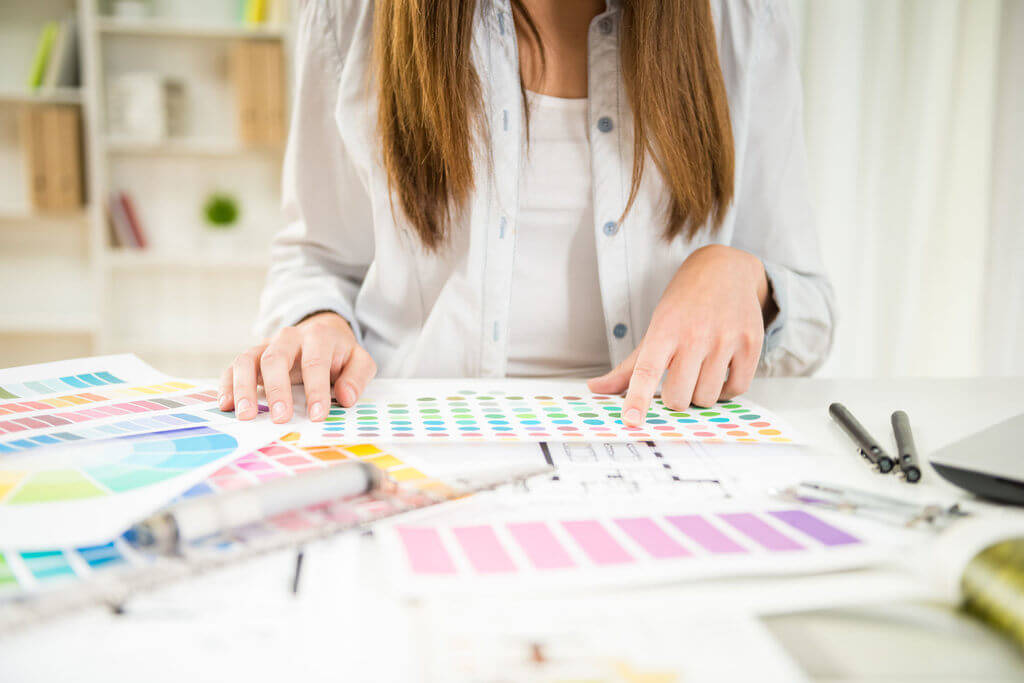 designer working with color samples in her office.