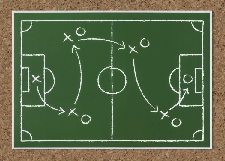 a drawn pitch field showing strategy for the game