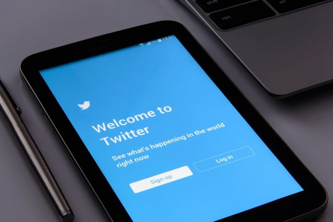 a tablet with log in page of social media platform Twitter where you can set up your Twitter business account