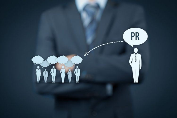Public relations (PR) concept. Businessman think about PR services (public relations) and its impact to public.