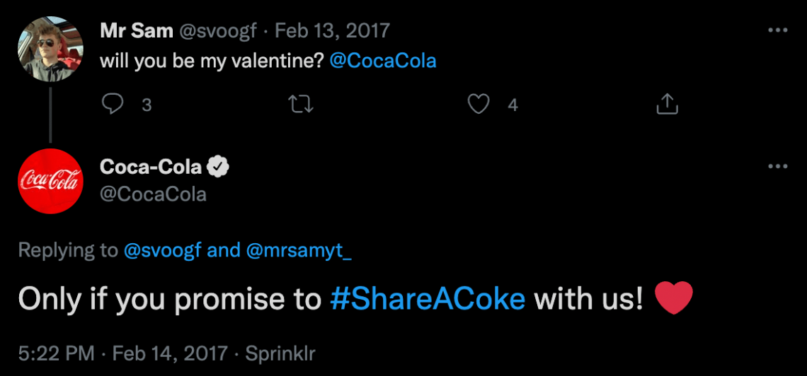 Coca-Cola tweeting with their branded hashtag #ShareACoke.